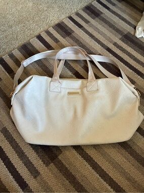 Juicy Couture weekender / travel bag in Cream Monogram Vegan Leather